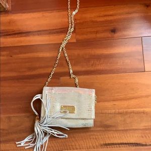 Gold tasseled evening bag